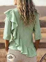 Cascading Ruffle V-Neck Top