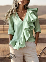 Cascading Ruffle V-Neck Top